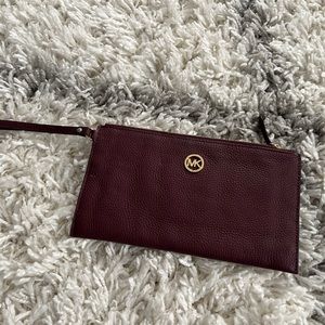 Excellent condition burgundy wristlet Michael kors